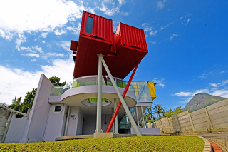 Illustration for article titled Seven Shipping Containers Make Up This Colorful Library